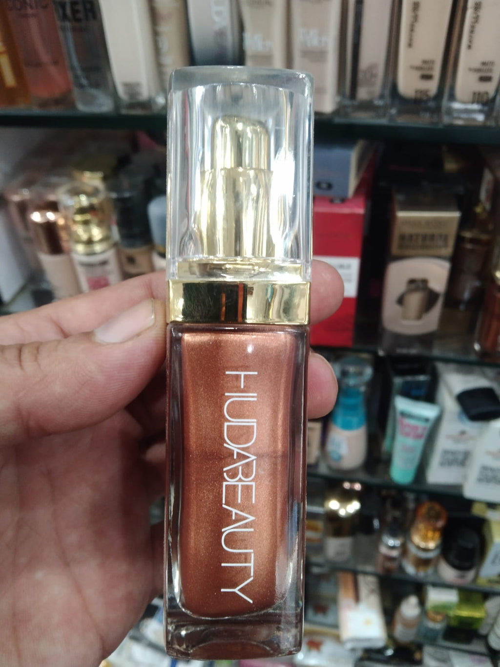 Huda Beauty N.Y.M.P.H. All Over Body Highlighter – Liquid Illuminator for Face, Body &amp; Legs – Water-Based, Long-Lasting Glow – 35 ml image 1